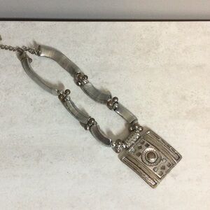 Chunky Silver coil with stamped silver pendant Egyptian feel necklace